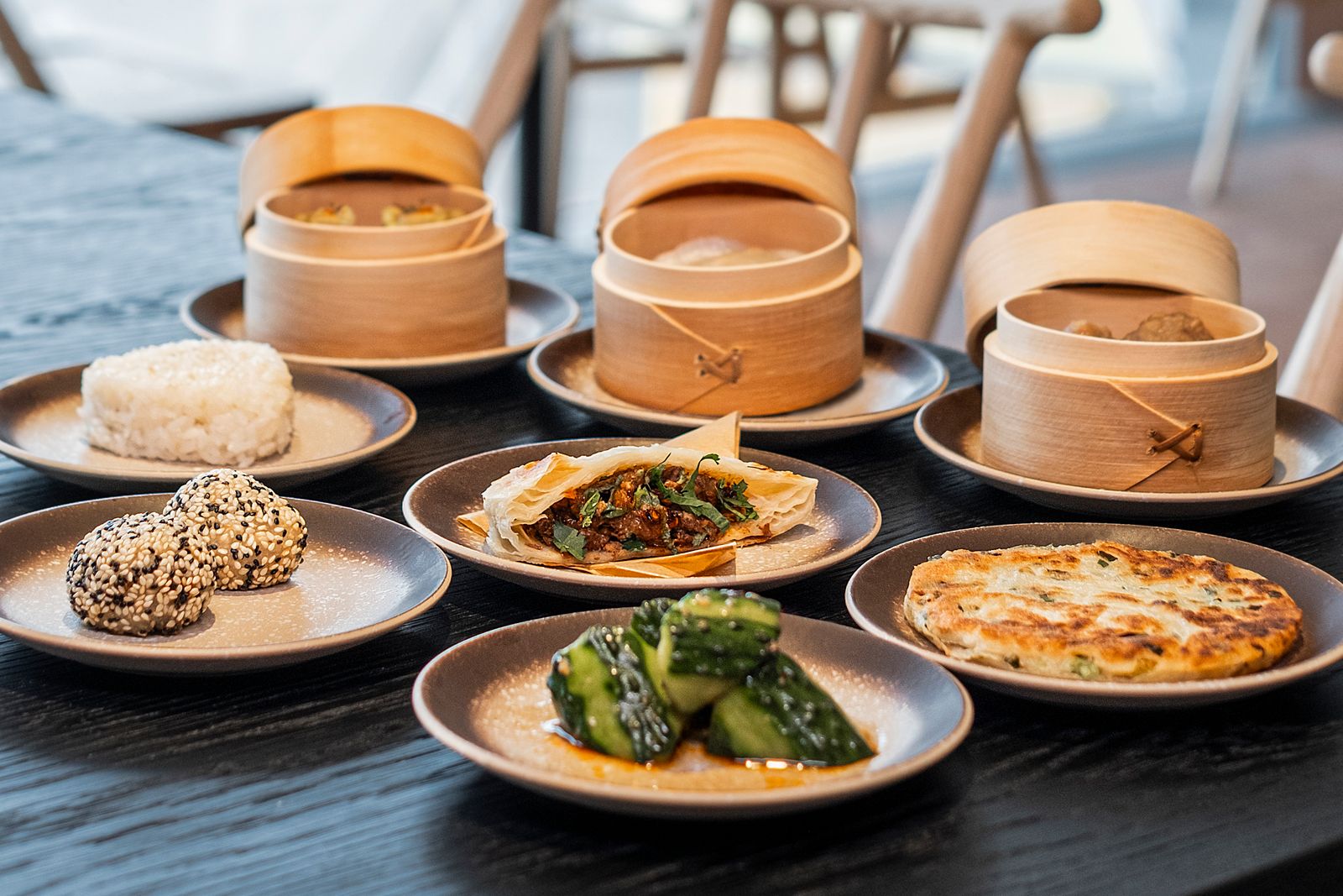Close-up of a beautifully presented brunch plate and artisanal bread.