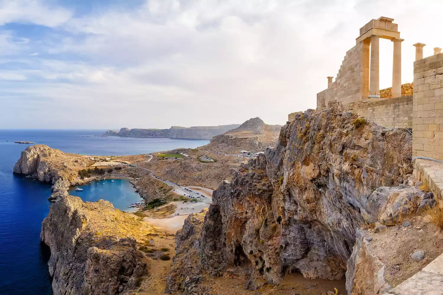 The ancient Doric columns of the Temple of Athena Lindia overlooking St. Paul's Bay.