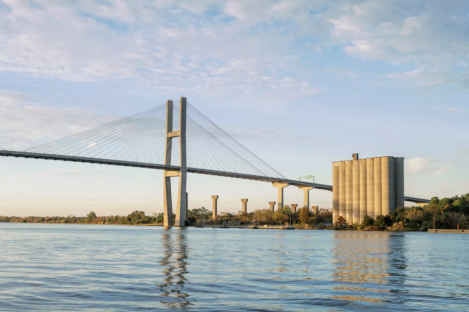 A peaceful view of the riverfront and historic architecture in Savannah, Georgia.