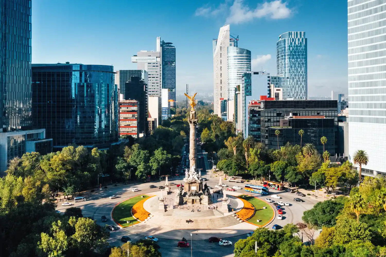 Aerial shot of the Angel of Independence monument on Paseo de la Reforma in Mexico City.