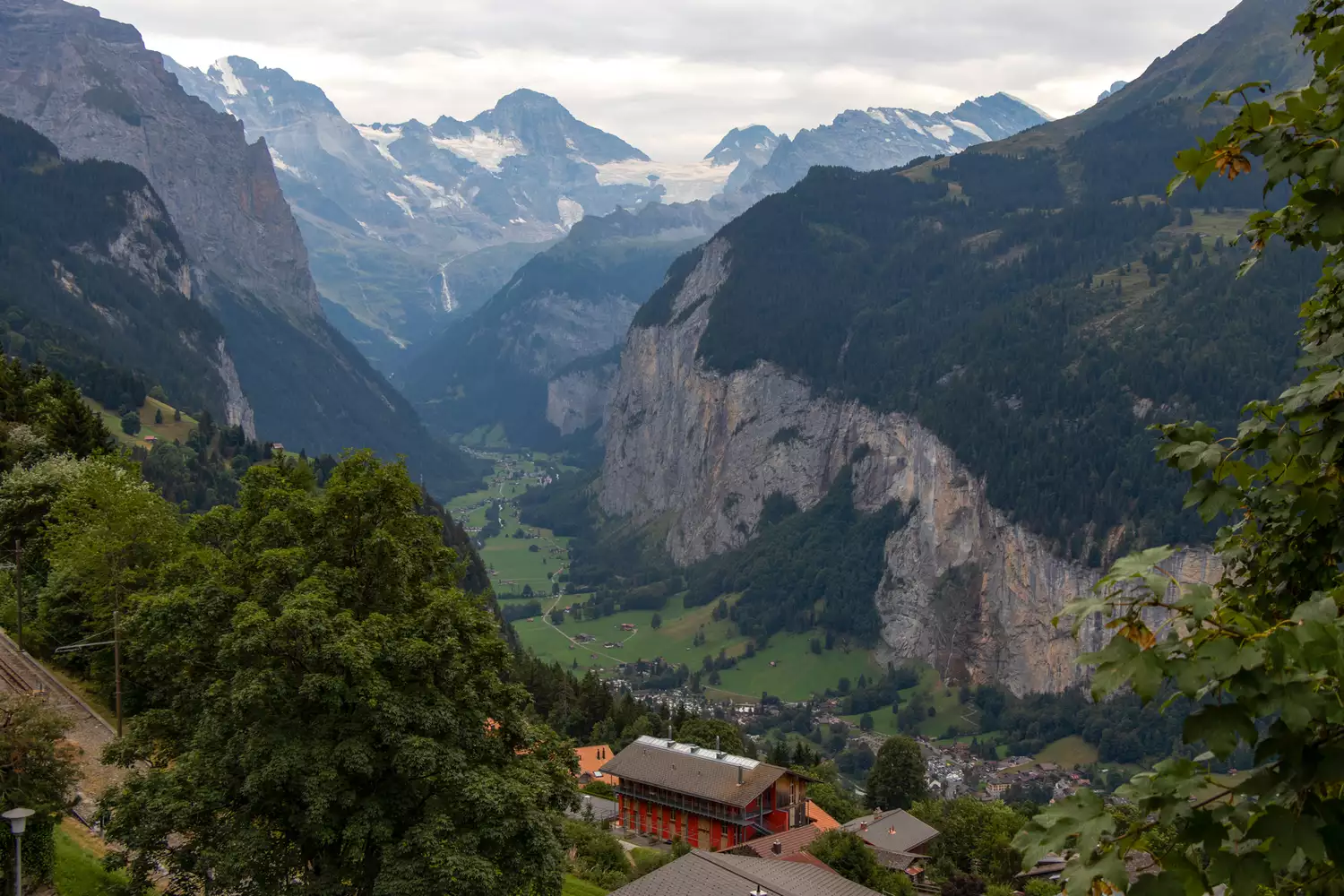 A small, scenic village nestled among the snow-capped peaks of the Swiss Alps.
